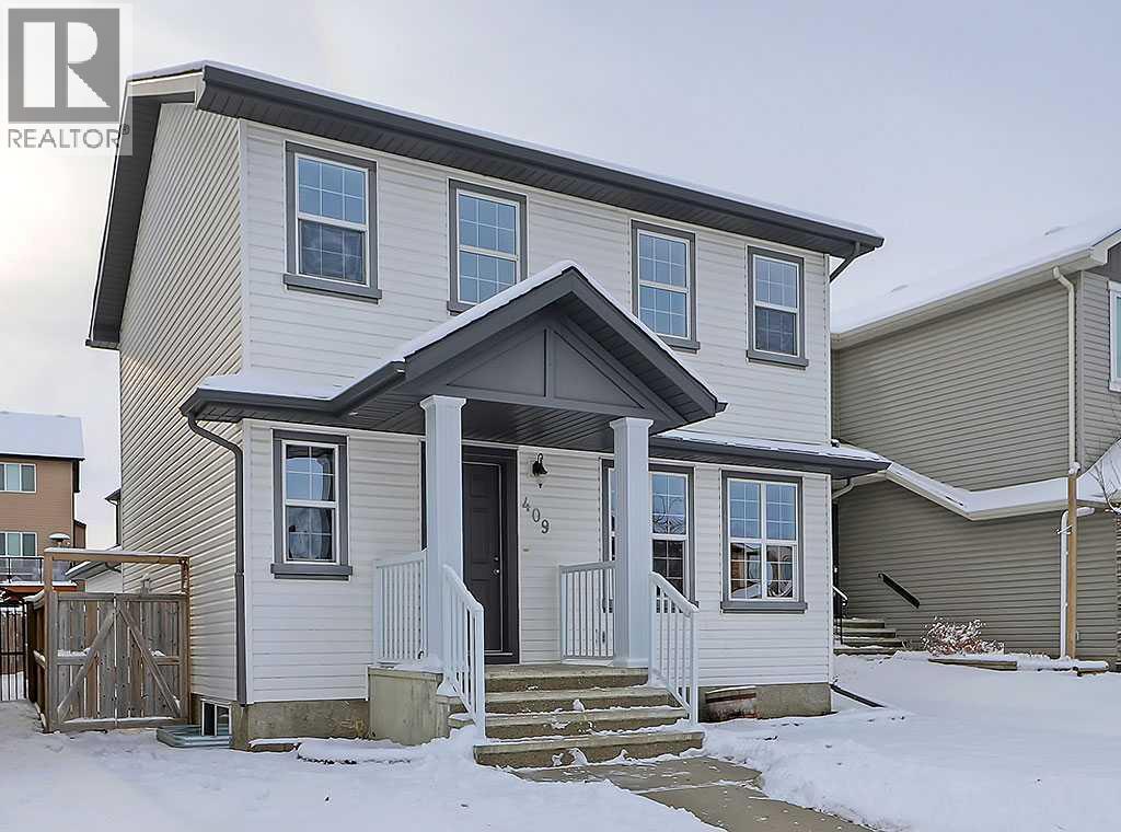 409 Cimarron Boulevard, Okotoks, Alberta  T1S 0A9 - Photo 1 - A2269381