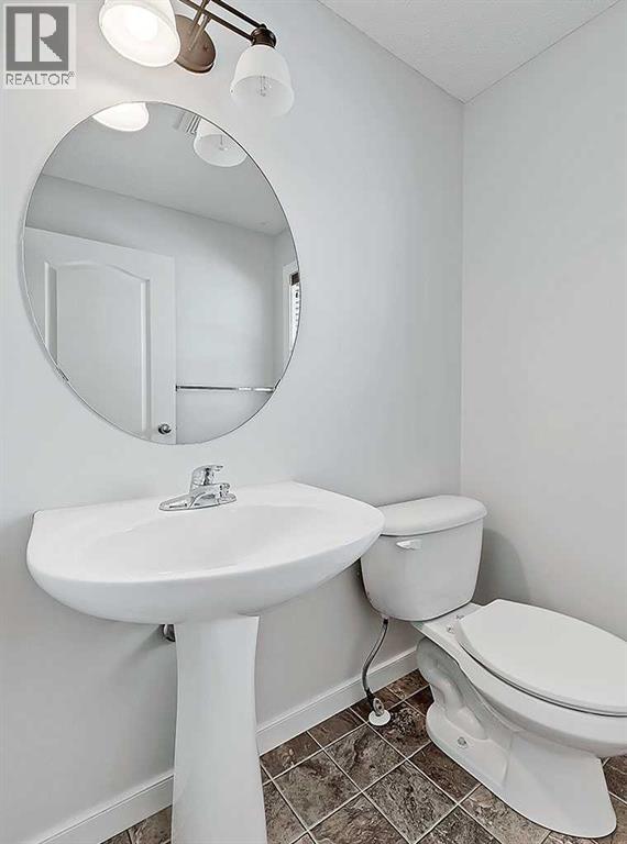 409 Cimarron Boulevard, Okotoks, Alberta  T1S 0A9 - Photo 15 - A2269381