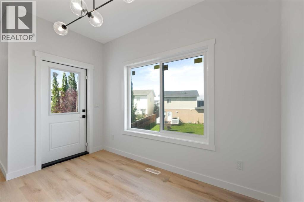 9 Mcclung Gate, Carstairs, Alberta  T0M 0N0 - Photo 13 - A2273235