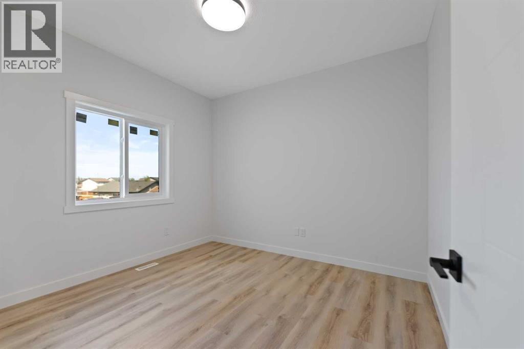 9 Mcclung Gate, Carstairs, Alberta  T0M 0N0 - Photo 14 - A2273235