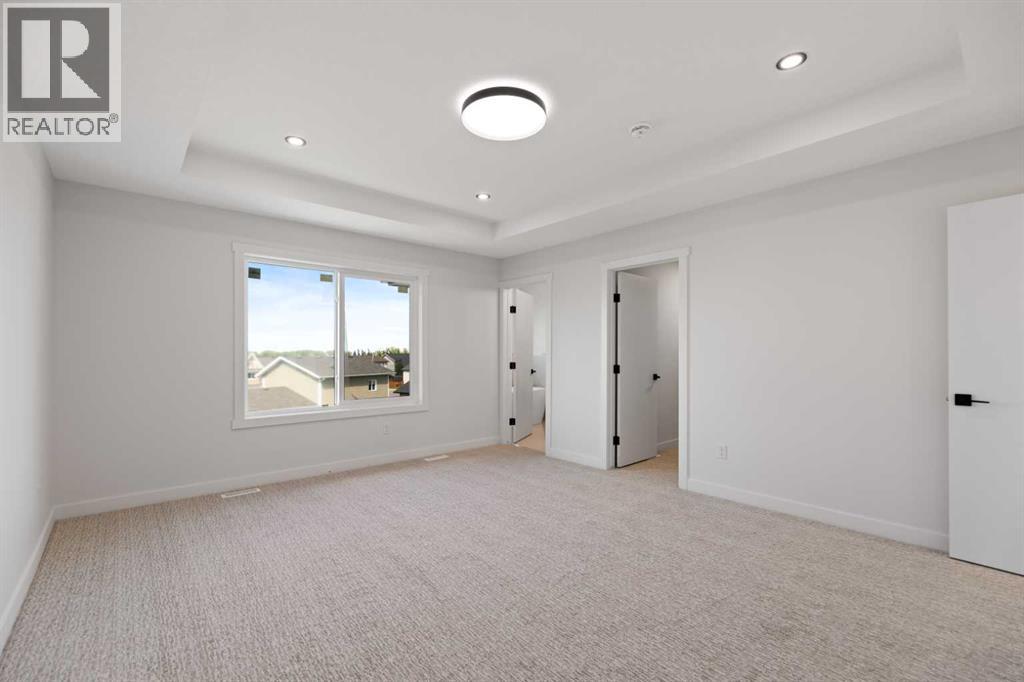 9 Mcclung Gate, Carstairs, Alberta  T0M 0N0 - Photo 19 - A2273235