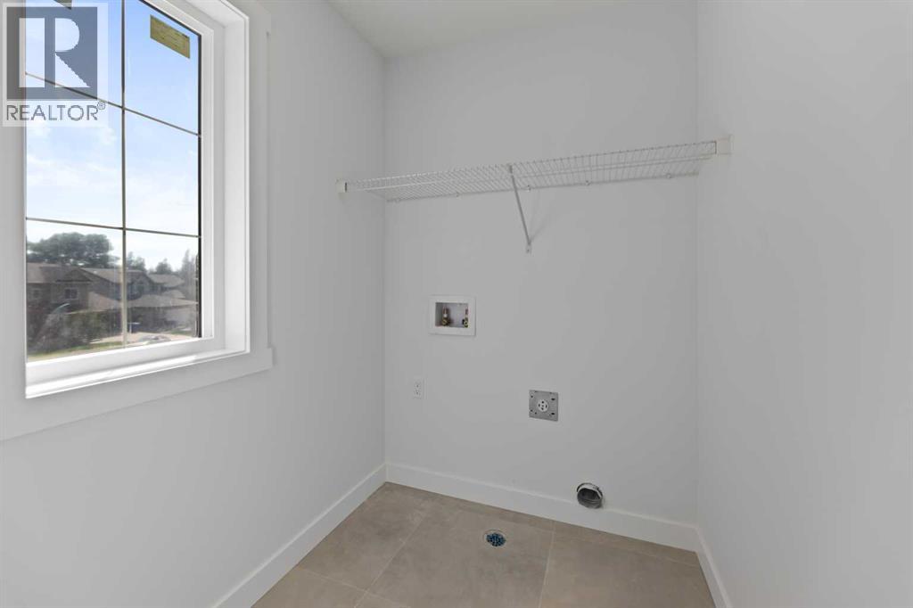 9 Mcclung Gate, Carstairs, Alberta  T0M 0N0 - Photo 29 - A2273235