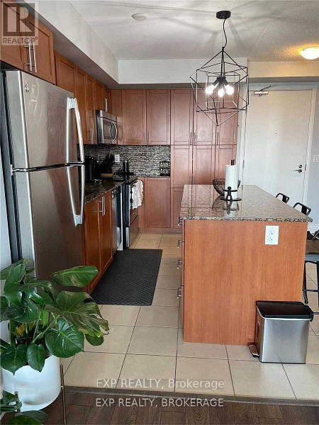 702 - 830 Lawrence Avenue E, Toronto, Ontario  M6A 3C6 - Photo 5 - W12588348