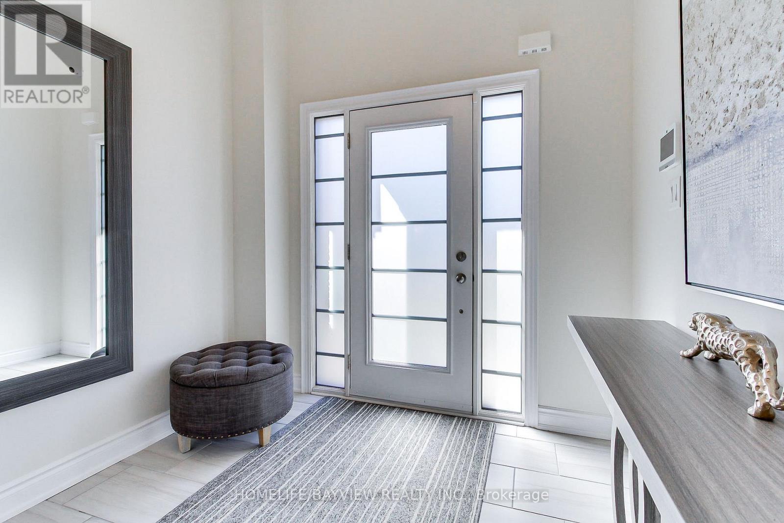 70 Lorne Thomas Place, New Tecumseth, Ontario  L9R 0V8 - Photo 2 - N12471089