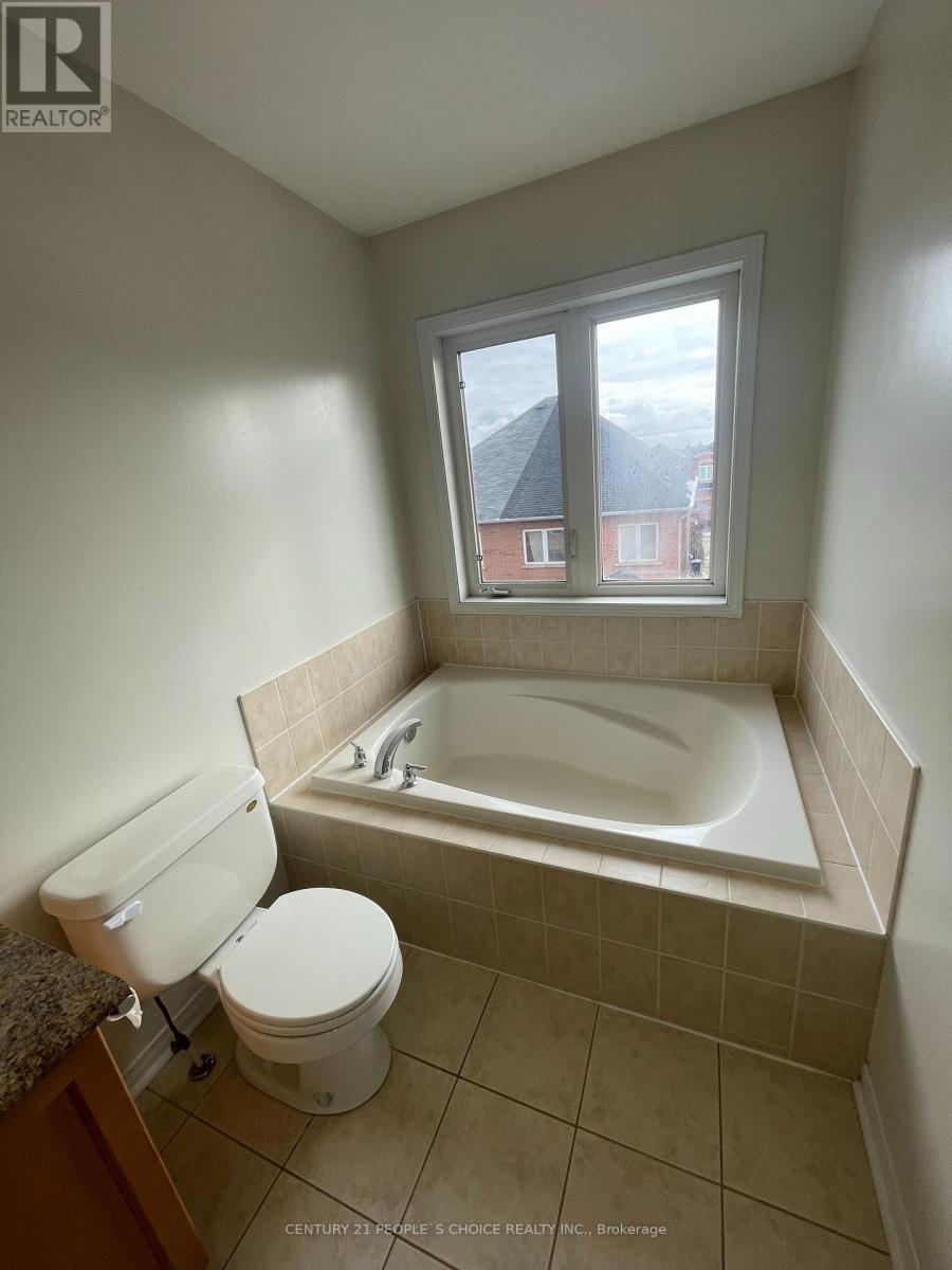 51 Portrush Trail, Brampton, Ontario L6X 0R2 - Photo 4 - W12563190