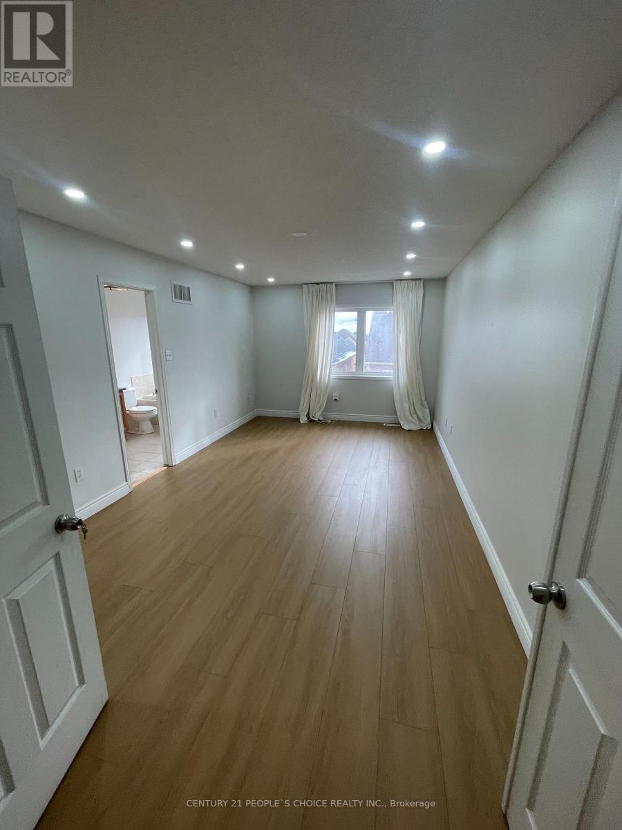 51 Portrush Trail, Brampton, Ontario L6X 0R2 - Photo 7 - W12563190