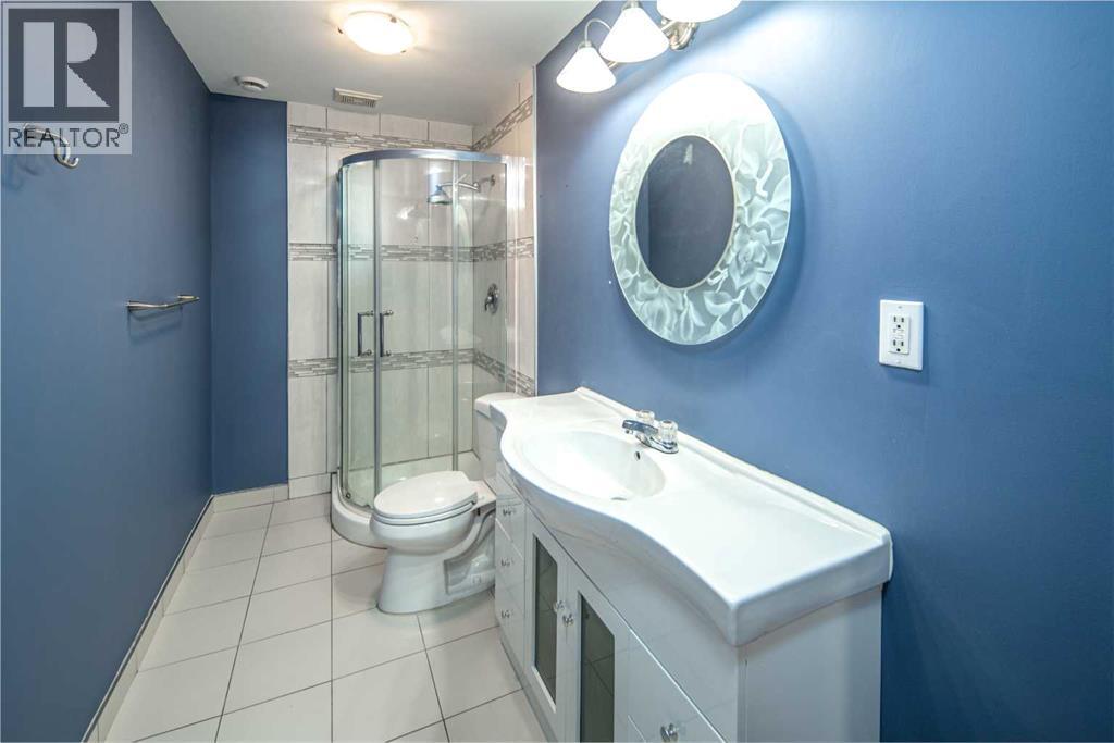 18 Hidden Creek Point Nw, Calgary, Alberta  T3A 6J6 - Photo 31 - A2272344