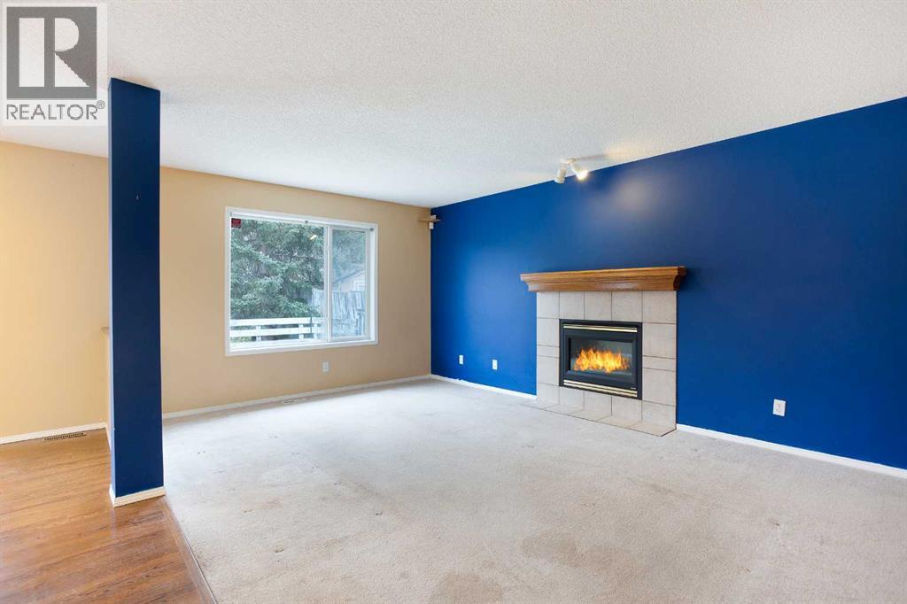 29 Spring Crescent Sw, Calgary, Alberta  T3H 3V1 - Photo 4 - A2267356