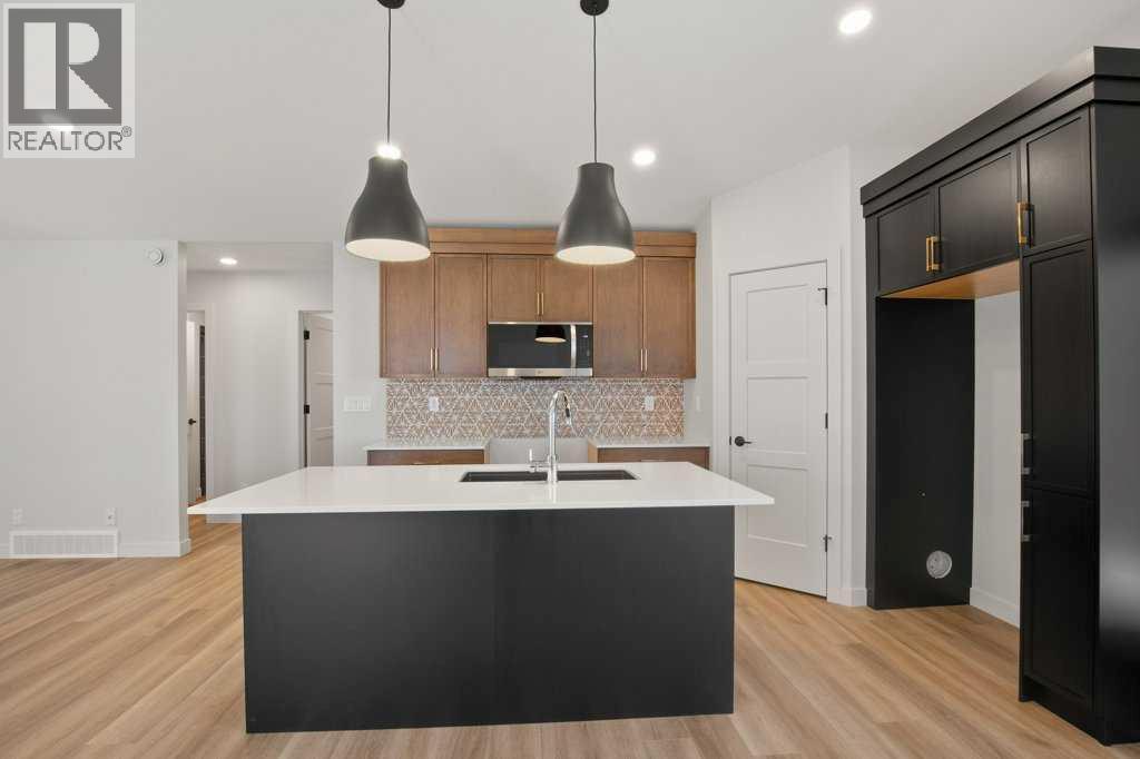 154 Norseman Close, Penhold, Alberta  T0M 1R0 - Photo 4 - A2221980