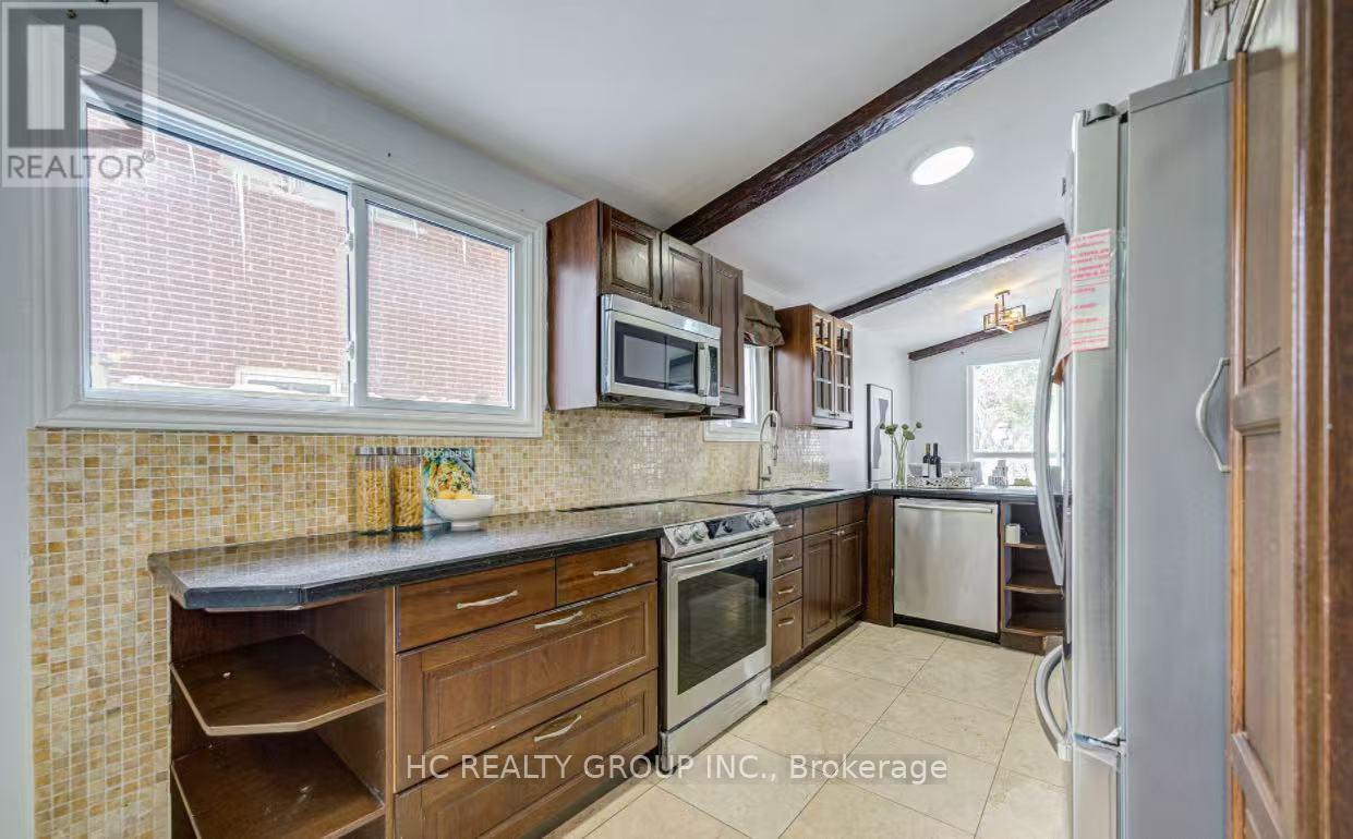 61 Kingslake Road, Toronto, Ontario M2J 3E4 - Photo 4 - C12588888