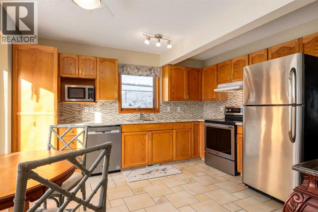 48 Patina Point Sw, Calgary, Alberta  T3H 3J7 - Photo 5 - A2272836