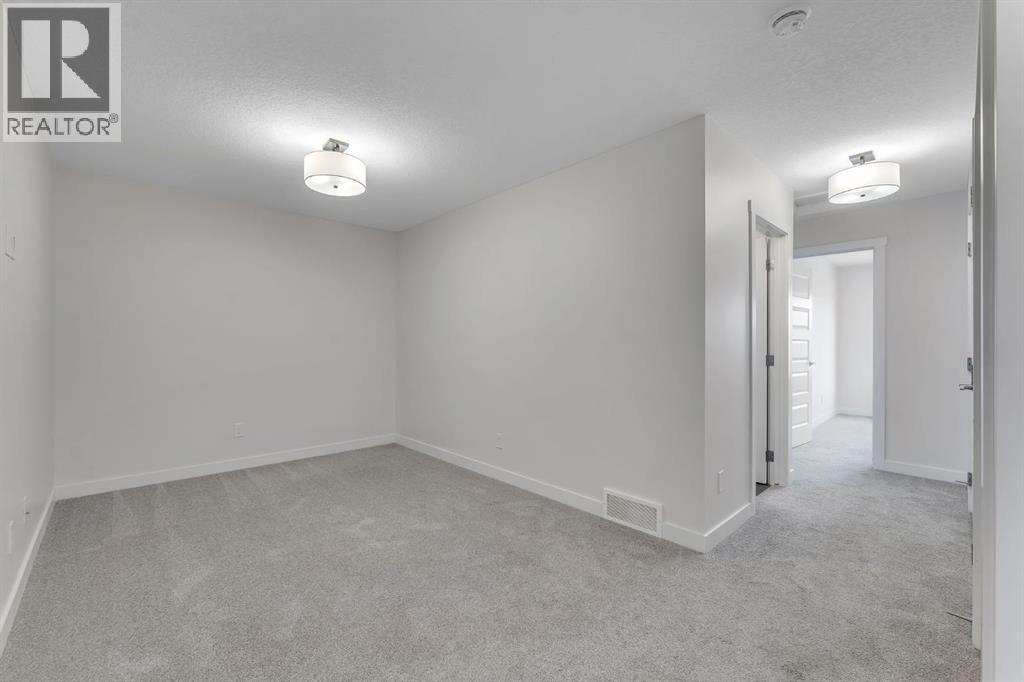 1489 Bayview Point Sw, Airdrie, Alberta  T4B 5K1 - Photo 21 - A2268070