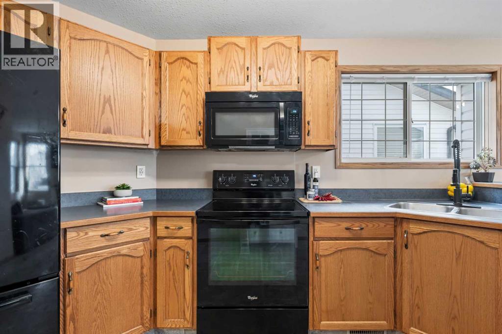 306 Coventry Road Ne, Calgary, Alberta  T3K 5K5 - Photo 11 - A2270908