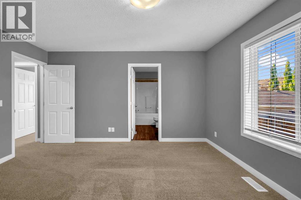 201 Morningside Gardens Sw, Airdrie, Alberta  T4B 0C9 - Photo 19 - A2252532