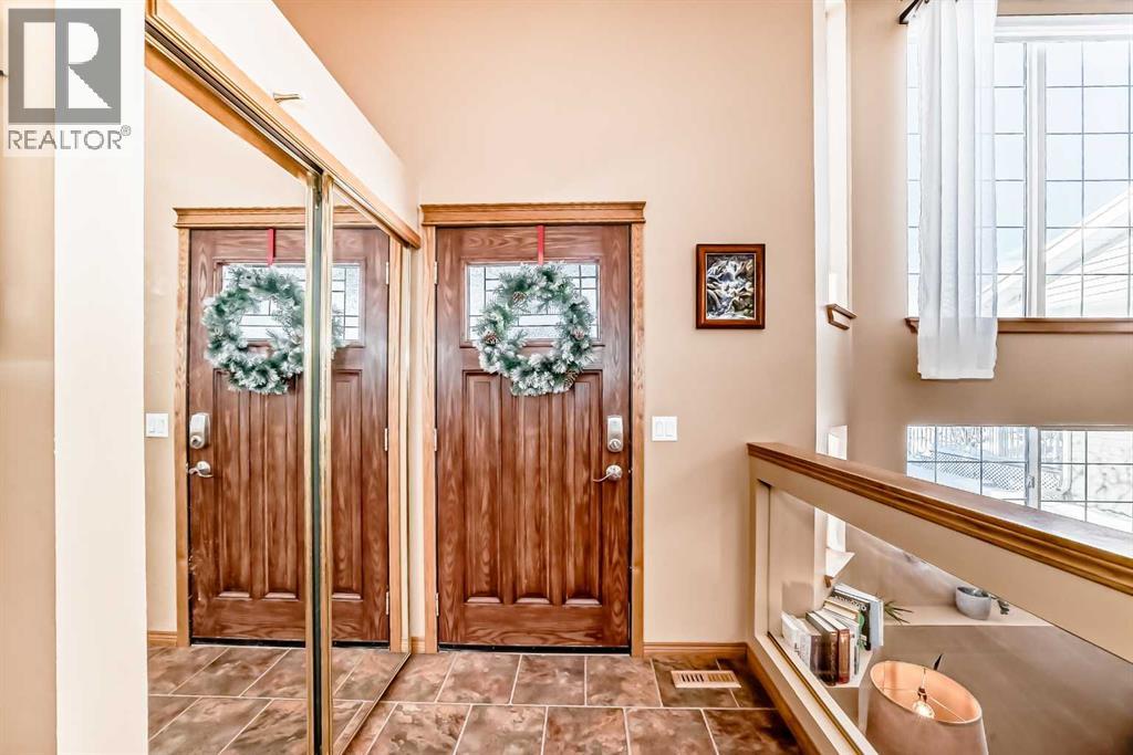 203 Hidden Spring Green Nw, Calgary, Alberta  T3A 5N4 - Photo 3 - A2272070