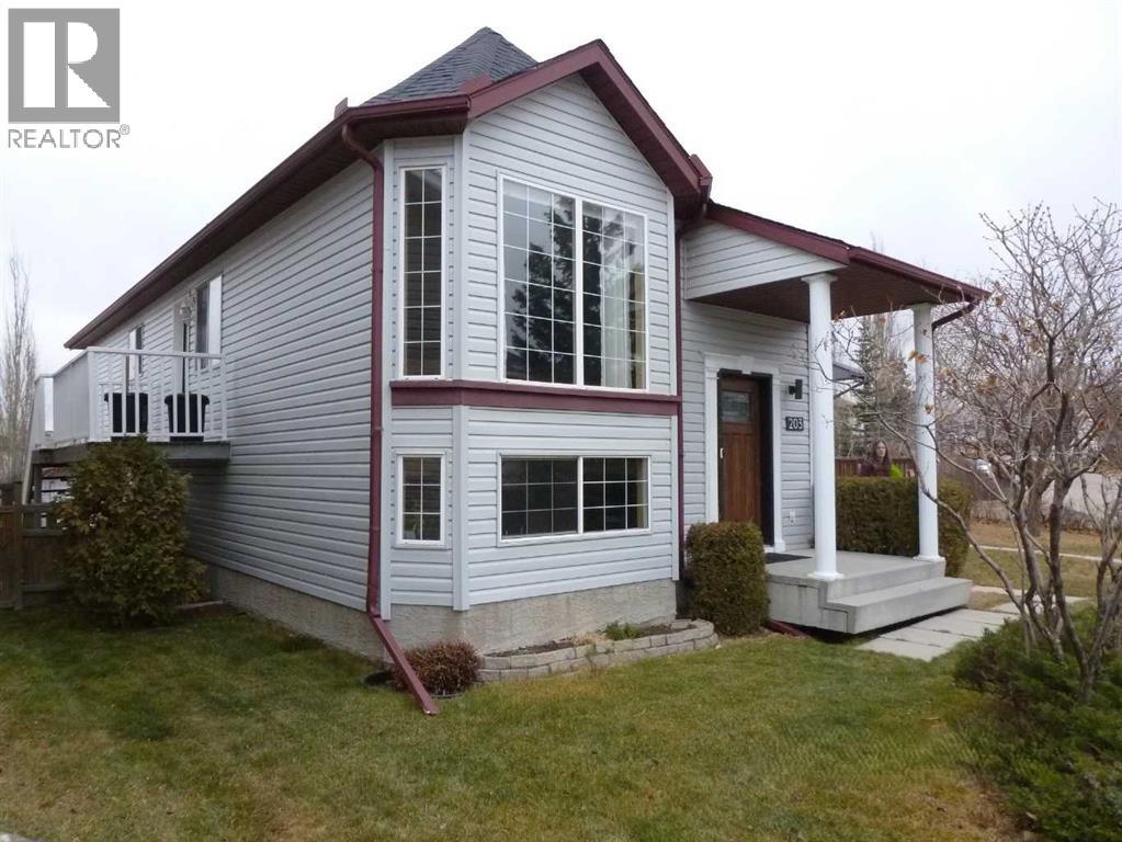 203 Hidden Spring Green Nw, Calgary, Alberta  T3A 5N4 - Photo 2 - A2272070