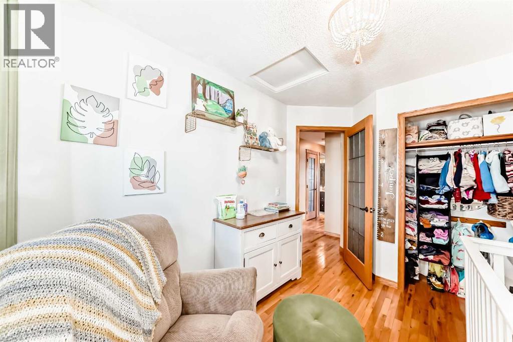 203 Hidden Spring Green Nw, Calgary, Alberta  T3A 5N4 - Photo 19 - A2272070