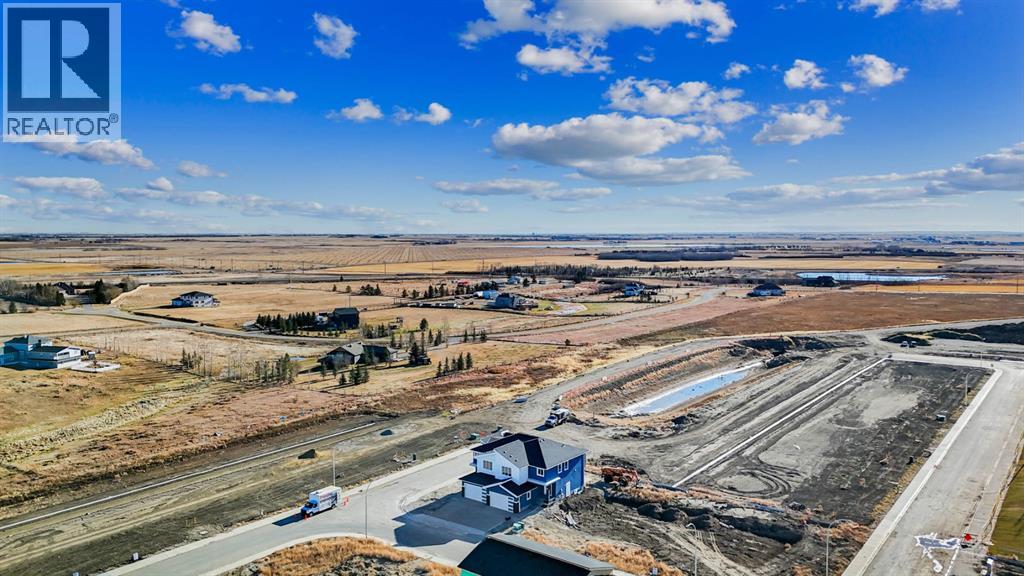 126 Waterstone Way, Chestermere, Alberta  T1X 3B2 - Photo 5 - A2269077