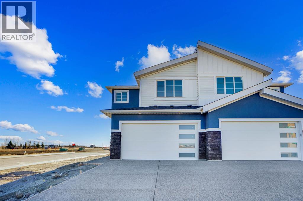 126 Waterstone Way, Chestermere, Alberta  T1X 3B2 - Photo 1 - A2269077