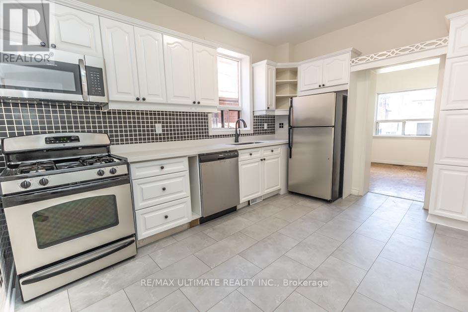 Main - 147 Perth Avenue, Toronto, Ontario  M6P 3X2 - Photo 7 - W12589190