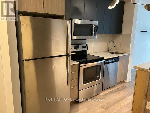 B215 - 5240 Dundas Street, Burlington, Ontario  L7L 0J6 - Photo 2 - W12589562