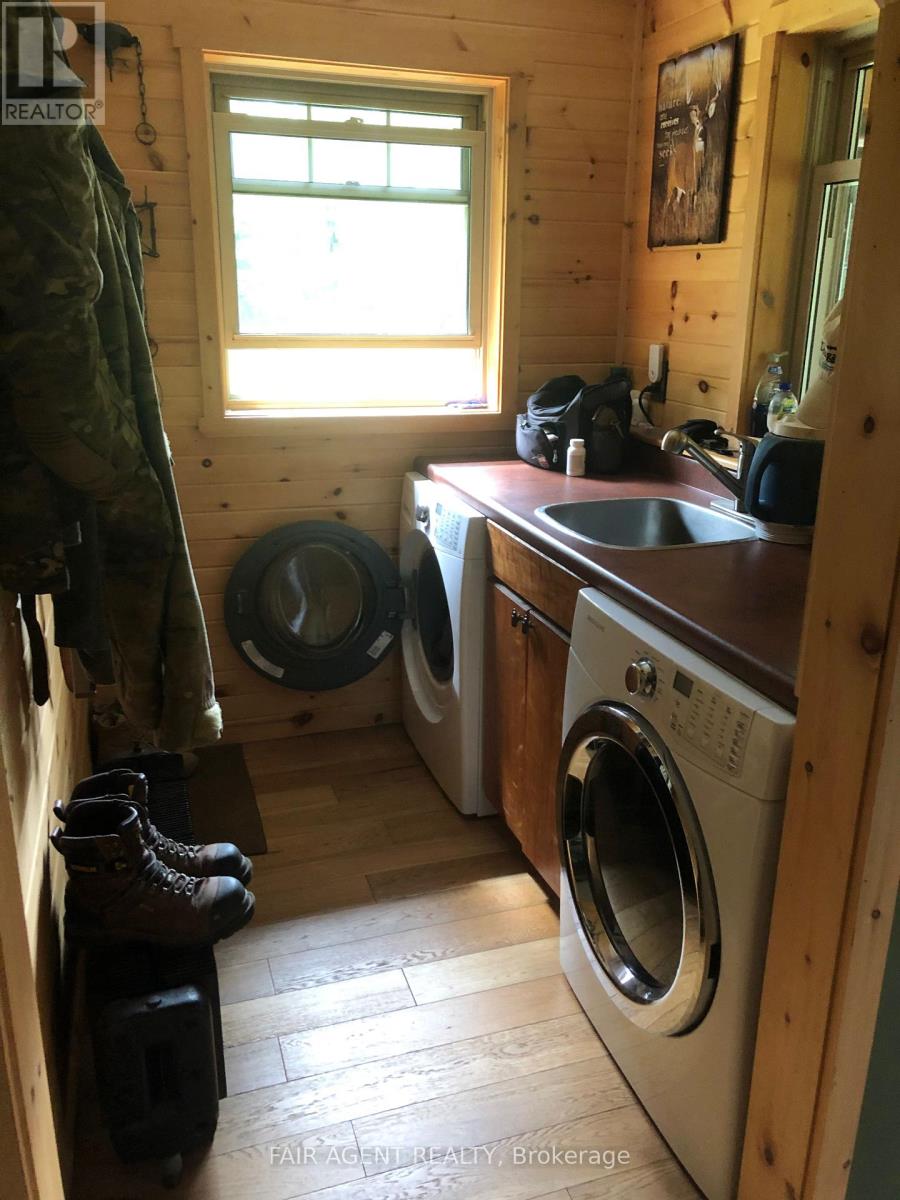 68 Wah-Wash-Kesh Road, Whitestone, Ontario  P0A 1G0 - Photo 10 - X12527624