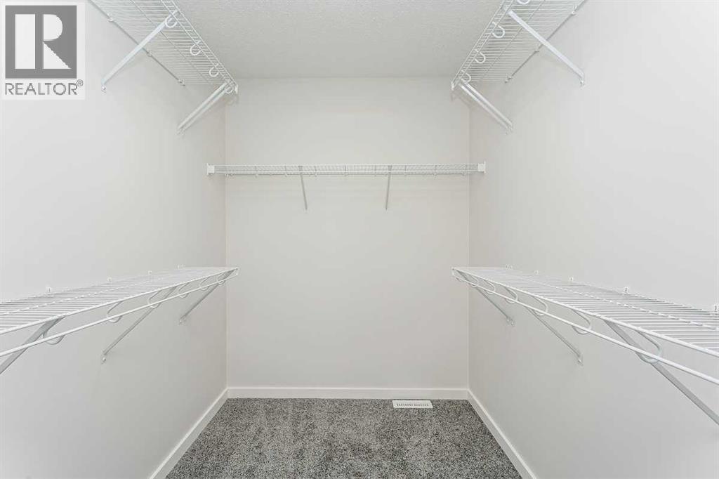 147 Lincoln Crescent, Rural Red Deer County, Alberta  T4E 3E5 - Photo 9 - A2270235