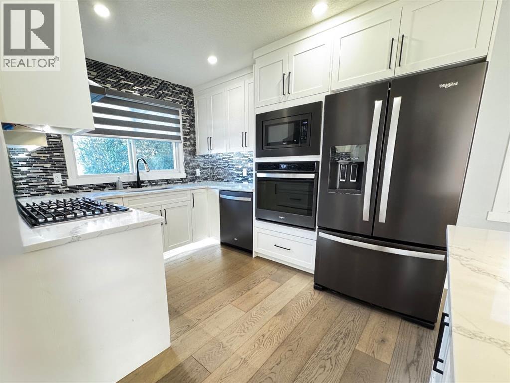 10304 Elbow Drive Sw, Calgary, Alberta  T2W 1G1 - Photo 2 - A2270871