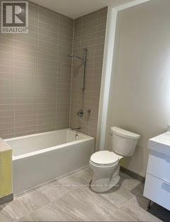 209 - 123 Maurice Drive, Oakville, Ontario  L6K 2W6 - Photo 2 - W12589966