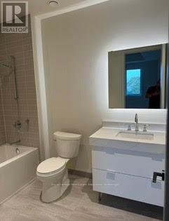 209 - 123 Maurice Drive, Oakville, Ontario  L6K 2W6 - Photo 3 - W12589966