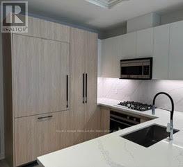 209 - 123 Maurice Drive, Oakville, Ontario  L6K 2W6 - Photo 5 - W12589966