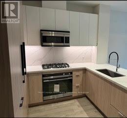 209 - 123 Maurice Drive, Oakville, Ontario  L6K 2W6 - Photo 7 - W12589966