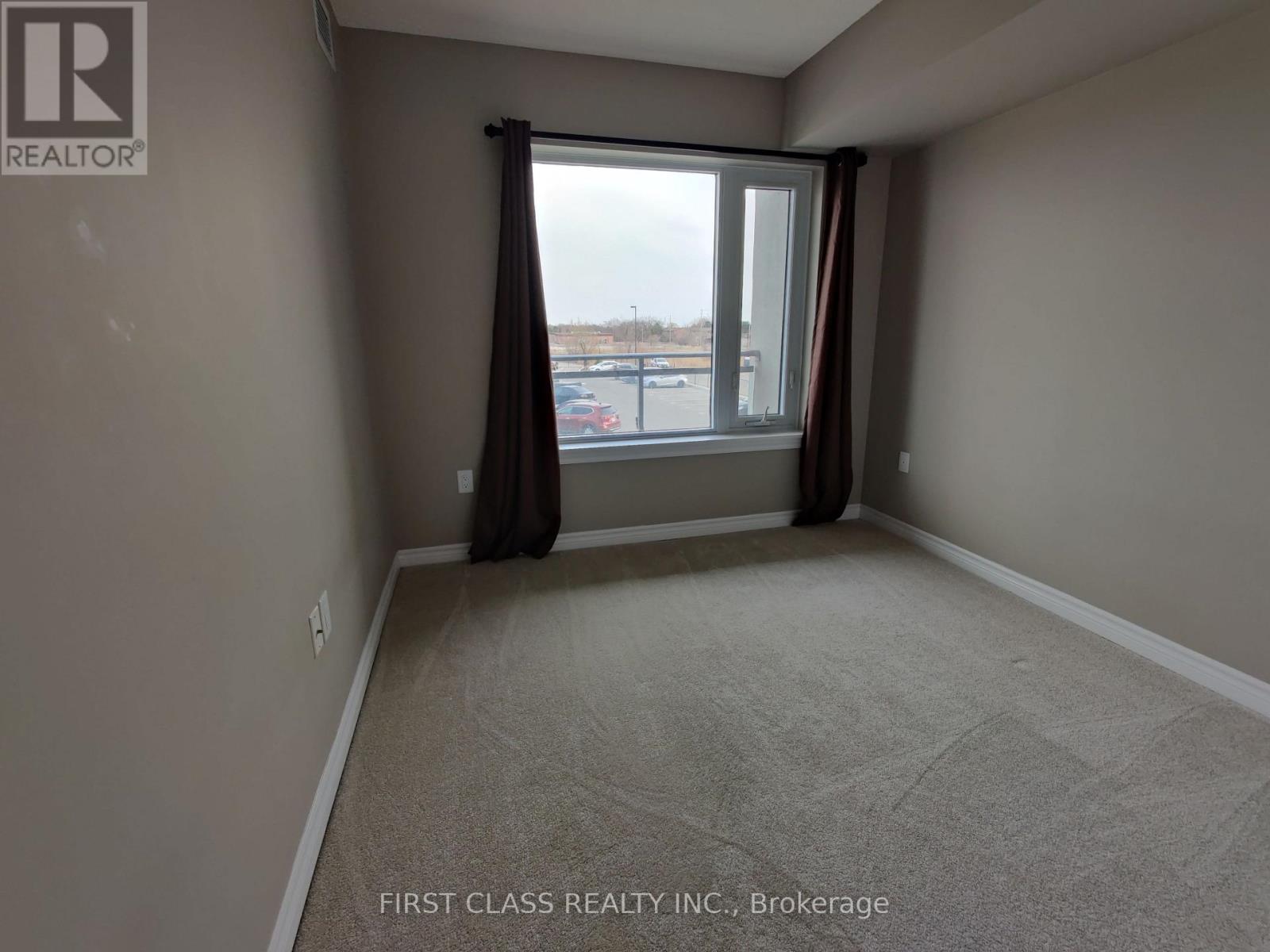 206 - 716 Main Street E, Milton (Tm Timberlea), Ontario  L9T 9L9 - Photo 8 - W12590214