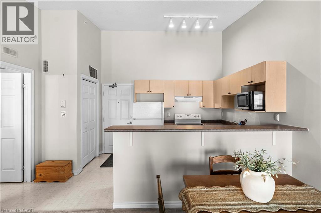 1411 Walker's Line Unit# 409, Burlington, Ontario  L7M 4P5 - Photo 4 - 40780088