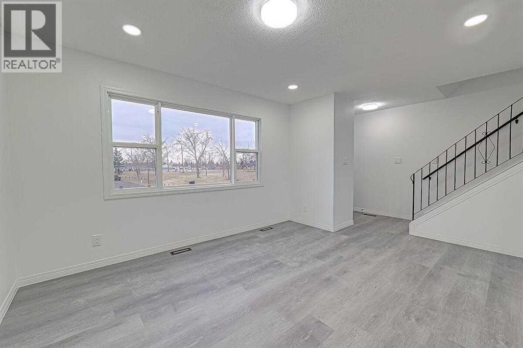 404 Pinehill Road Ne, Calgary, Alberta  T1Y 2M6 - Photo 4 - A2271881