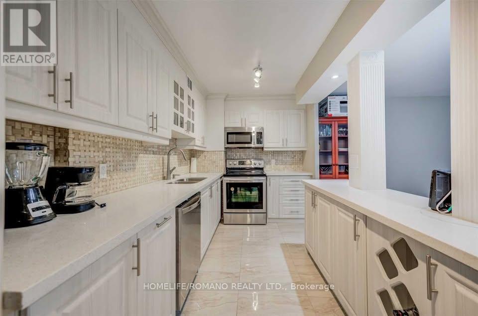 406 - 9 Four Winds Drive, Toronto, Ontario  M3J 2S8 - Photo 4 - W12590002