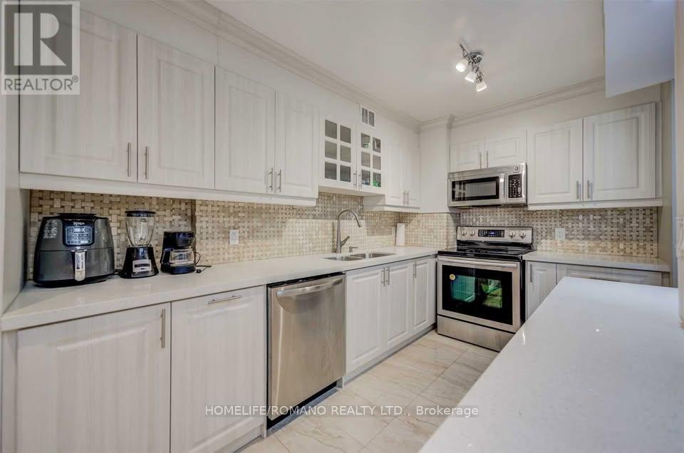 406 - 9 Four Winds Drive, Toronto, Ontario  M3J 2S8 - Photo 5 - W12590002