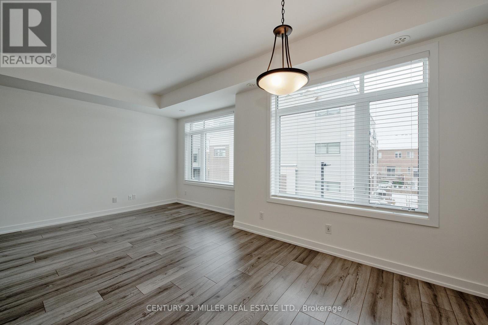 316 - 3058 Sixth Line, Oakville, Ontario  L6M 1P8 - Photo 2 - W12590698