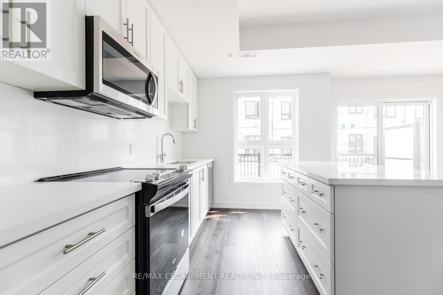 15 - 70 Kenesky Drive, Hamilton, Ontario  L8B 2A9 - Photo 7 - X12590874