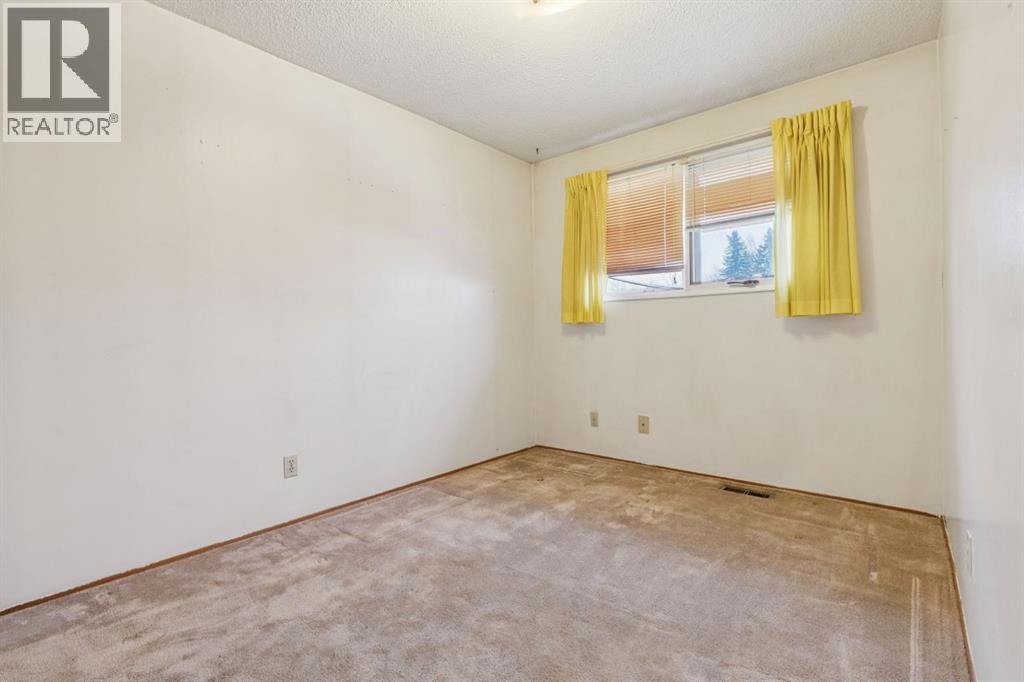 468 Queen Charlotte Road Se, Calgary, Alberta  T2J 4H7 - Photo 20 - A2273262