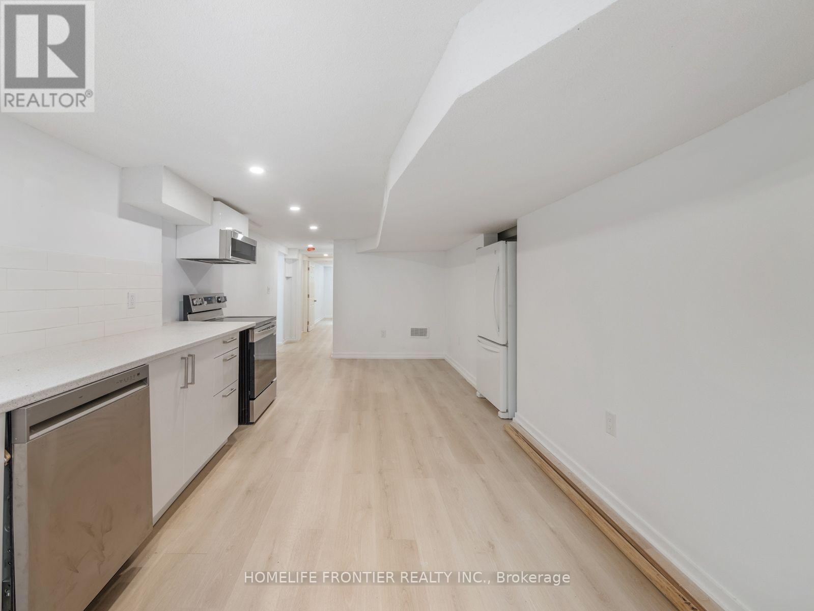 4 - 12 Gibson Avenue, Toronto, Ontario  M9V 2S6 - Photo 6 - W12418254