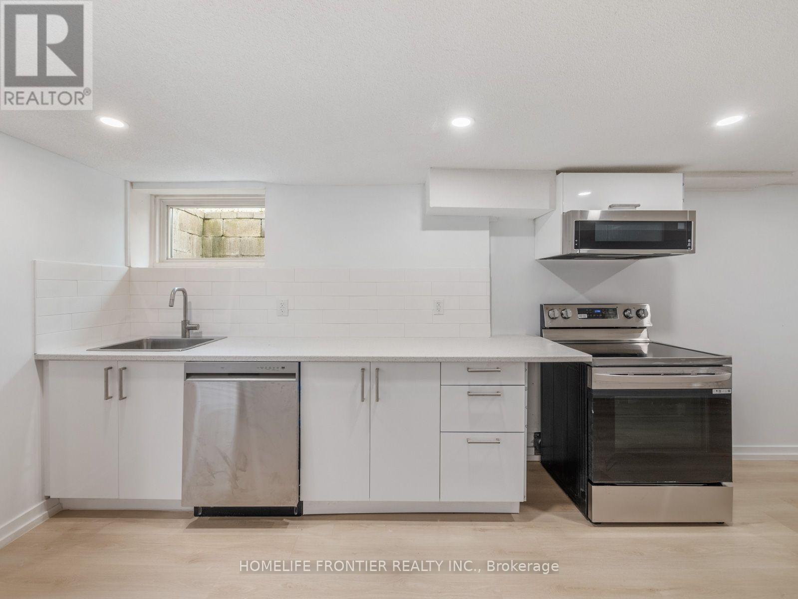 4 - 12 Gibson Avenue, Toronto, Ontario  M9V 2S6 - Photo 7 - W12418254