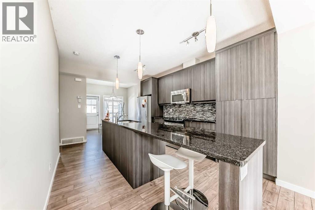 128 Marquis Lane Se, Calgary, Alberta  T3M 2G6 - Photo 4 - A2272660