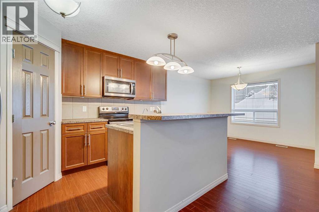 113 Cimarron Grove Close, Okotoks, Alberta  T1S 0H6 - Photo 13 - A2273223