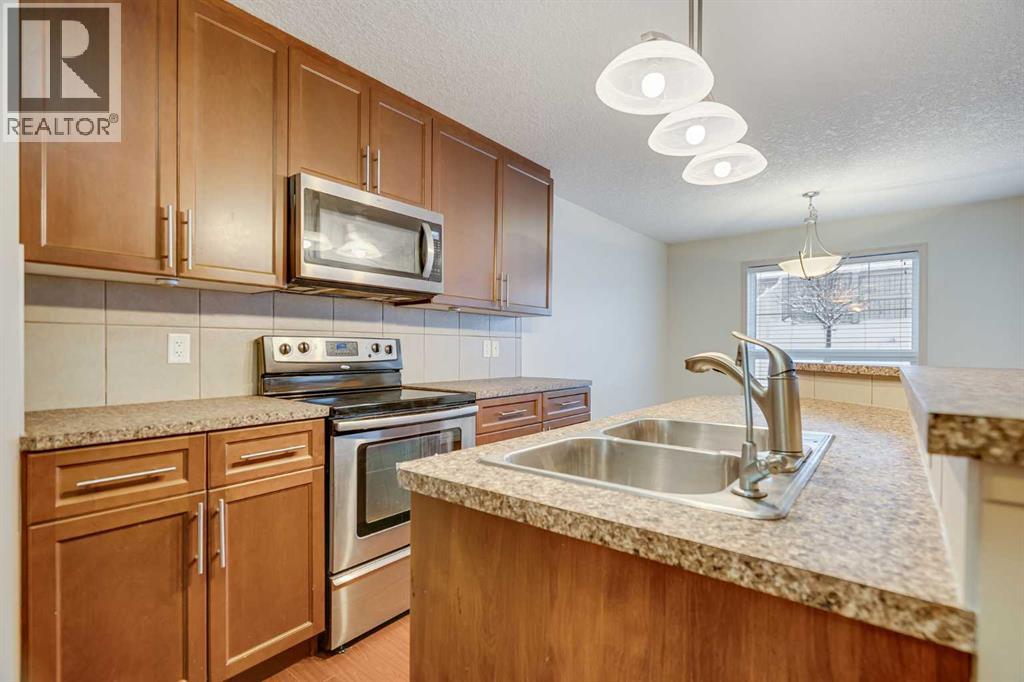 113 Cimarron Grove Close, Okotoks, Alberta  T1S 0H6 - Photo 12 - A2273223