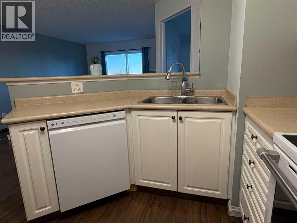 #418, 4000 Somervale Court Sw, Calgary, Alberta  T2Y 4J3 - Photo 2 - A2273458