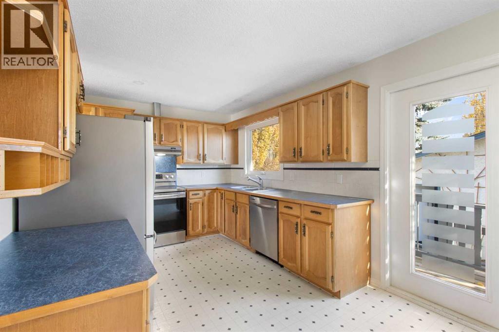 1452 Lake Sylvan Drive Se, Calgary, Alberta  T2J 3C8 - Photo 8 - A2265205