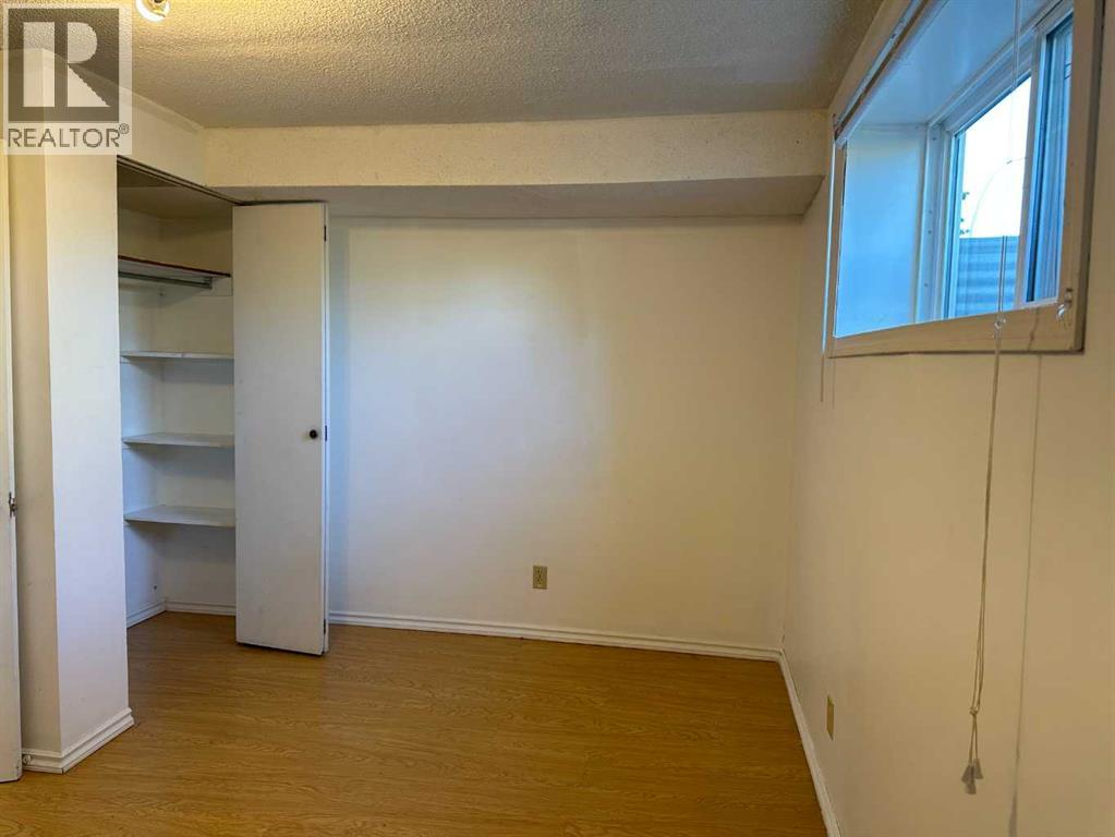 121 Huntford Close Ne, Calgary, Alberta  T2K 3Y7 - Photo 24 - A2259210