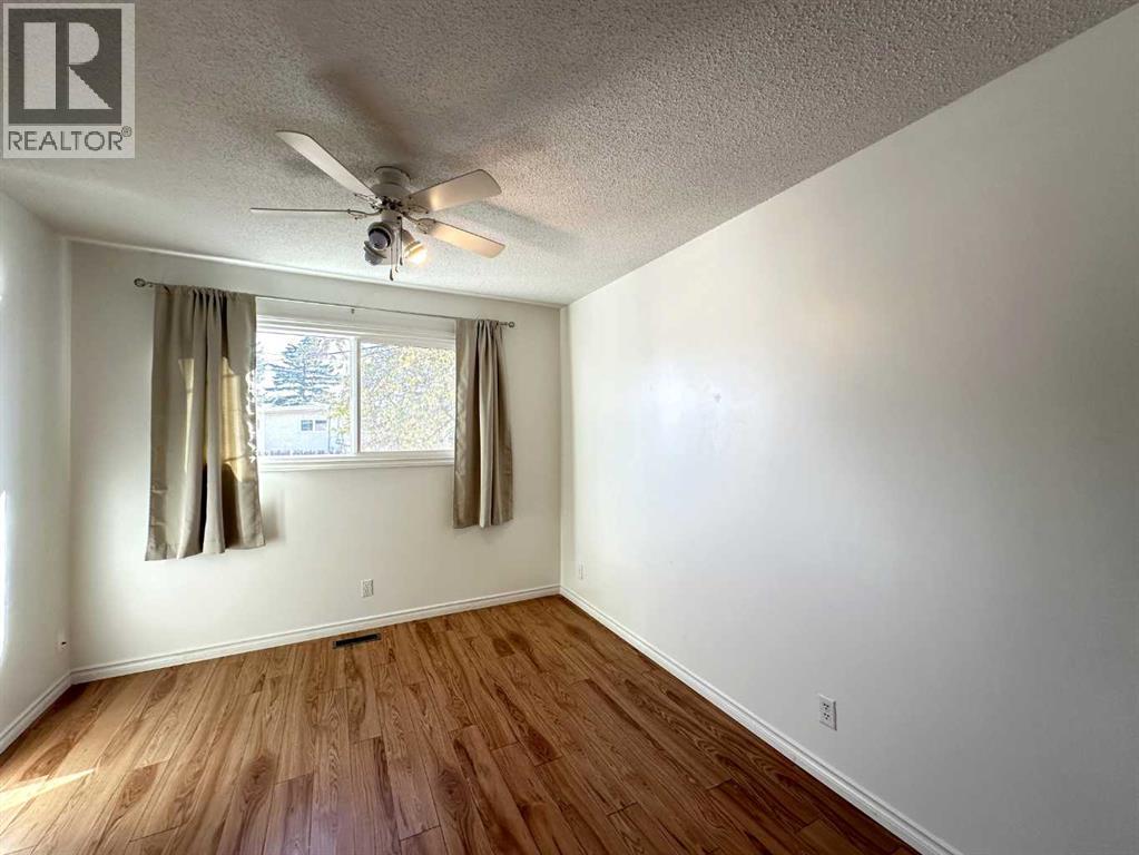 121 Huntford Close Ne, Calgary, Alberta  T2K 3Y7 - Photo 13 - A2259210