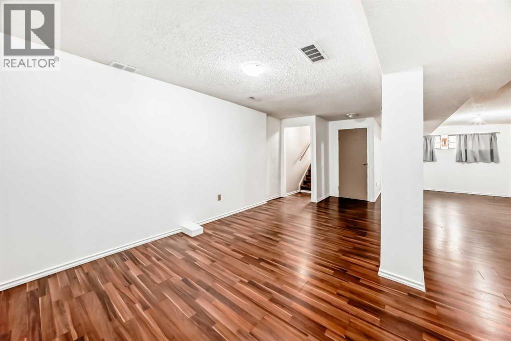 246 Berwick Drive Nw, Calgary, Alberta  T3K 1P5 - Photo 16 - A2254102